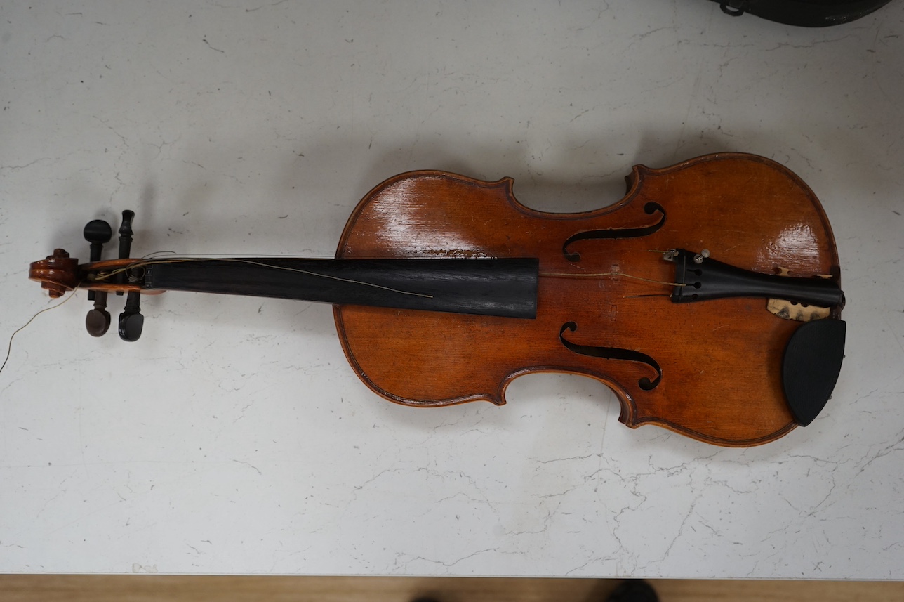 A cased full length violin, circa 1900 with bow, bears Stradivarius label to the interior. CITES Submission reference WVME8714